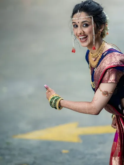 The infectious joy of a bride on her wedding day. This candid shot of a Maharashtrian bride captures the fun and excitement that I love to see at my events.