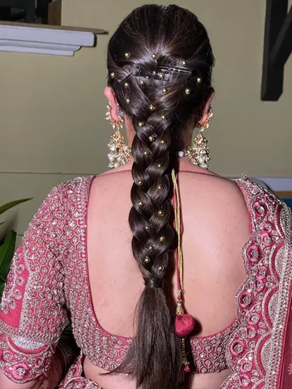 A simple and elegant braid for an early morning wedding ceremony. I've added small gold beads throughout the braid for a touch of subtle sparkle.