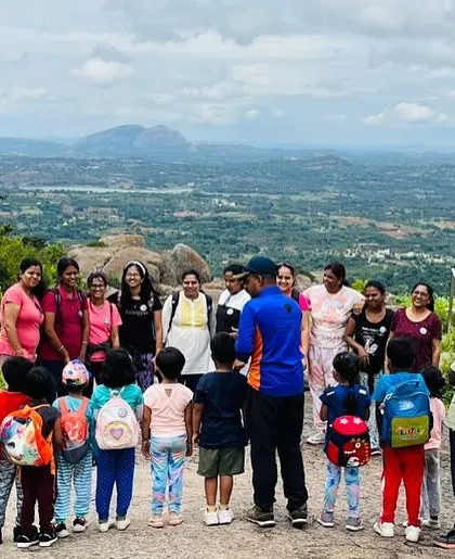 A group of mothers and children gathered at the scenic Uttari Betta.