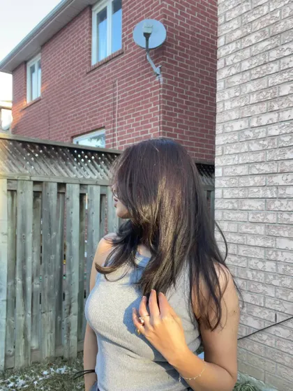A candid moment, with my hair covering my face, during the winter shoot.