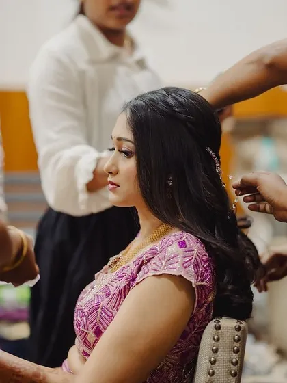 A candid shot from behind the scenes of Surabhi's Sangeeth. It takes a team to create the perfect look, and I love the energy of getting a bride ready.
