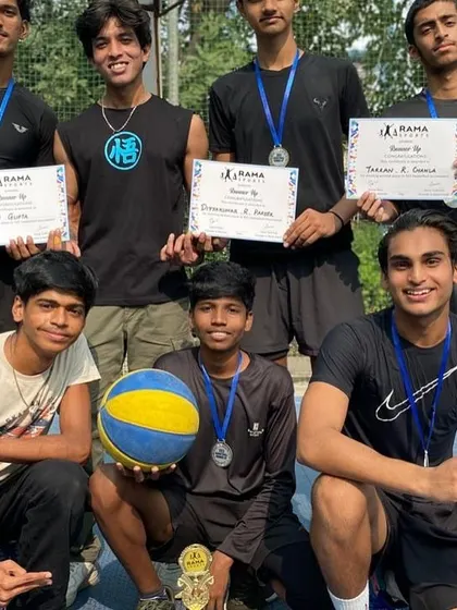 A tighter shot of the U-16 squad with their runner-up trophy and medals. You can see the determination and team spirit that got them to the finals.