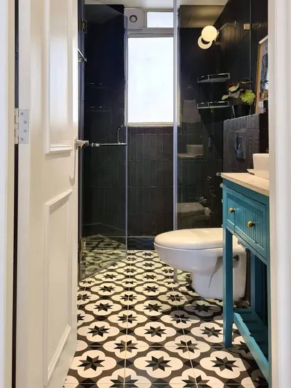 After shot of the moody bathroom in the Breeze Home.