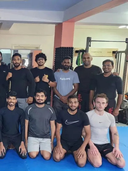 The whole team together. We experimented with some complex grappling chains and striking guards, then shared some pizza. That's what it's all about.