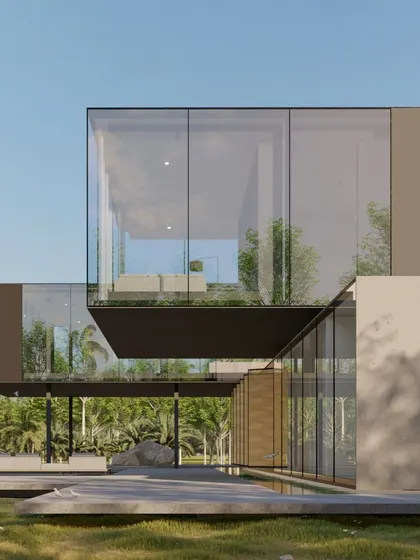 This minimalist farmhouse is conceived as two floating bars stacked over a public base. This view shows how the upper volumes, clad in glass and solid panels, create a dynamic composition while hovering lightly above the landscape.