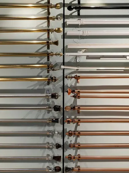 A selection of curtain rods and hardware. These small details make a big difference in the final design.