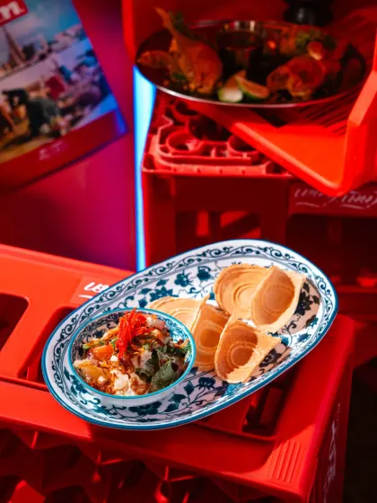 Another creative angle at Banng Bar, using stacked crates to create depth. The mix of red and blue lighting adds to the dynamic and modern feel of the bar's atmosphere.