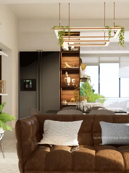 This view shows the transformation of the living space, where we introduced leisure areas and a cohesive aesthetic. By focusing on textures over vibrant colors, the home now feels more refined and spacious, reflecting the client's preference for a classic French theme.