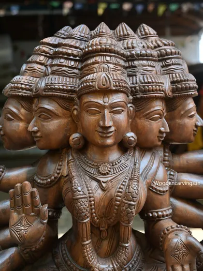 A close-up of the central face of the Panchamukha Gayathri Devi, showing her serene and all-seeing expression.