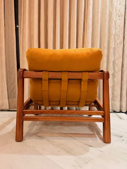 A back view of our "Marshmallow" Armchair, showing the strap details that support the plush suede cushions. The solid Ashwood frame provides a warm and sturdy base for this exceptionally comfortable chair.