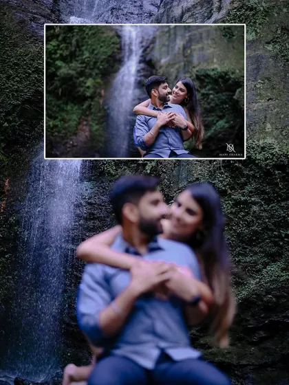 A romantic embrace in front of a waterfall in Shimla. The focus pull effect draws attention to the couple's connection.