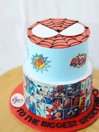 Your friendly neighborhood Spider-Man, in cake form. This two-tier cake features Spidey's iconic mask and a cool comic book print wrap, perfect for a superhero fan.