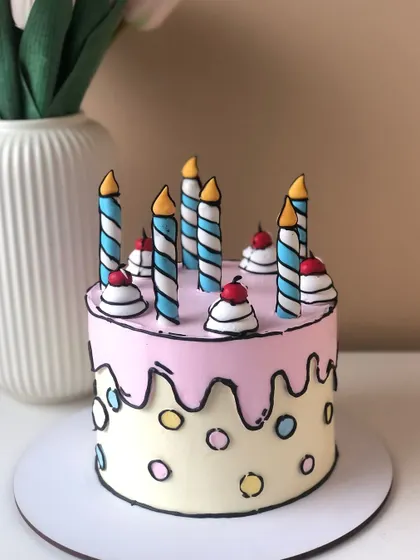 Another version of my popular comic cake, this one with a pink drip and colorful polka dots. This trend is so much fun to create.