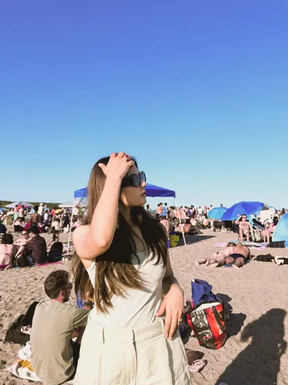 Soaking up the sun on a crowded beach on Canada Day.
