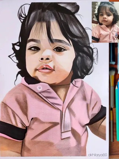 A close-up portrait of a baby girl on A4 paper. The use of colored pencils allows for soft skin tones and captures the innocent look in her eyes.