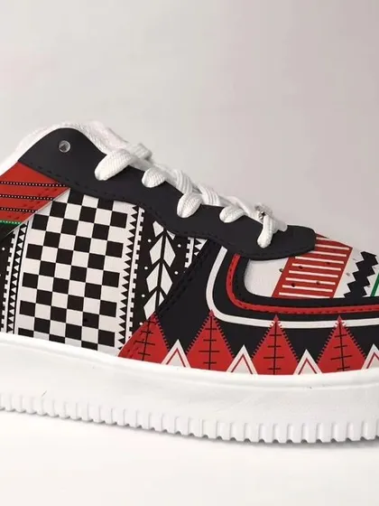 For this Liberty Shoes design, I took inspiration from the geometric weaves of Naga shawls from North East India. The bold, graphic patterns in red, black, and white make a powerful statement.
