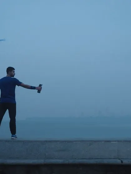 An artistic shot from our ad, showing a shooter in a moment of outdoor training, symbolizing freedom and focus.