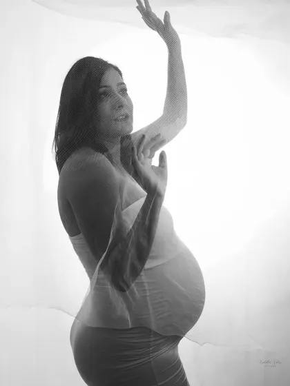 Another frame from the artistic veil series, this double exposure shot creates a sense of movement and dreaminess. It's a portrait that feels like a fleeting, beautiful memory.