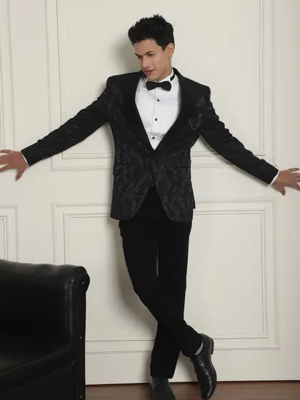 A tuxedo fits all special occasions. This black patterned tuxedo is a perfect choice for your engagement, cocktail, or reception.