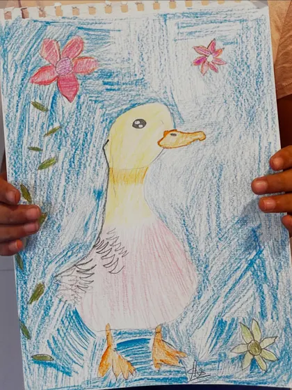 A lovely duck portrait with a textured blue background, showing the artist's exploration of different coloring techniques.