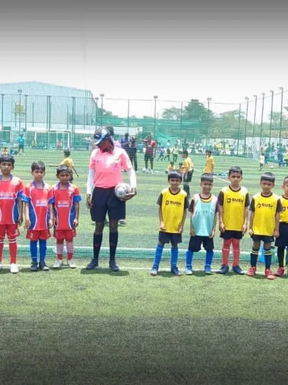 The pre-match lineup for our U7 team. This formal procedure helps instill professionalism and respect for the game from a young age.