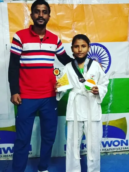 Another proud photo with my student and her awards.