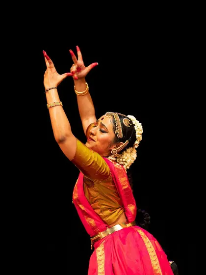 A beautiful action shot of Meera Krishna, her movements filled with grace and emotion.