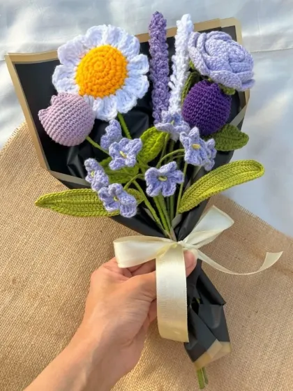 This "Lavender Love" bouquet is one of my favorites to make. It features a mix of daisies, tulips, lavender sticks, and forget-me-nots in calming shades of purple and white.