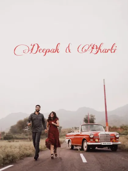 Running towards forever. This playful and dynamic shot captures the couple's joyful energy, with the vintage car and rolling hills creating a beautiful, cinematic backdrop for their pre-wedding adventure.