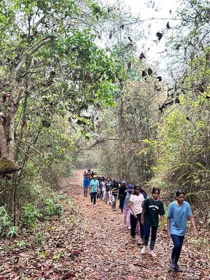 Students take a nature walk through the dense forests of Dandeli, part of our holistic camp experience.