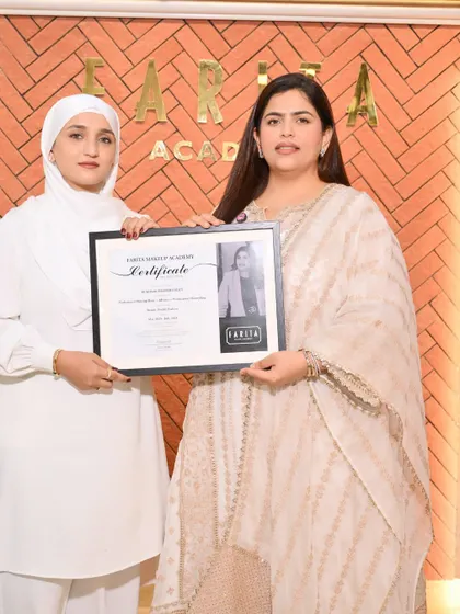 Another proud graduate from Batch 103 receiving her certificate. With passion in her heart and brushes in hand, she is ready for a bold new career.
