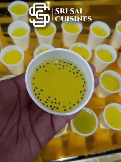 A simple yet refreshing Pineapple welcome drink, infused with sabja seeds. It's a sweet and tangy start to the culinary journey at your event.