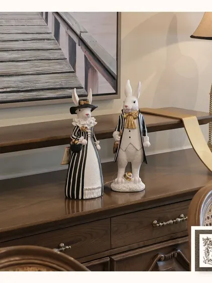 These gentlemen rabbit ornaments bring a whimsical and classic touch to a desk or console table. Dressed in their finest attire, they add a storybook charm to your decor.