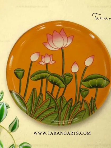 This exquisite hand-painted wooden plate features a lotus design in the traditional Pichwai style. The serene imagery and delicate brushwork make it a beautiful and calming piece of wall decor.