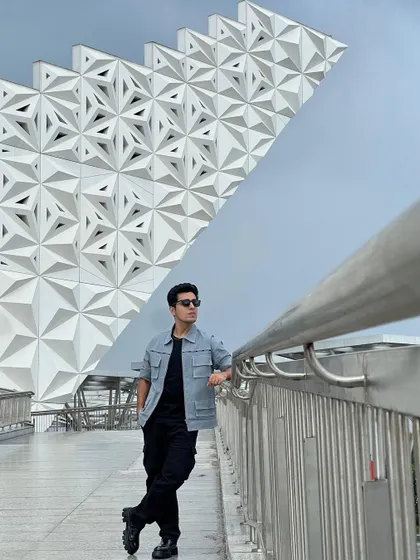 A wide shot capturing the full modern look I styled for Gagan Arora's appearance as a tech influencer for Vivo.