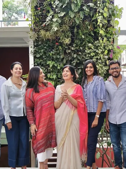 A candid, happy moment with our founders and team.