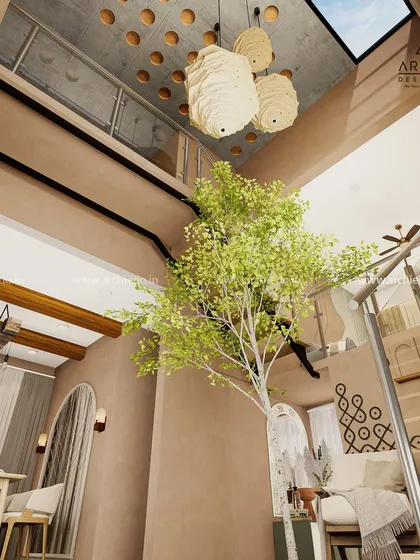 A stunning duplex with an indoor tree and a skylight. This design brings nature inside, creating a bright, airy, and unique living experience.