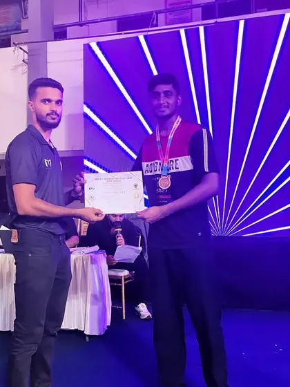 Our fighter receiving his certificate and medal at the WMC National Muay Thai Championship in Kochi.