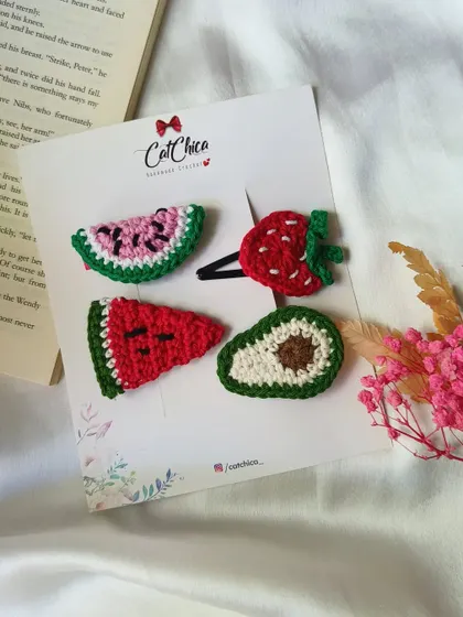 Add some fruity fun to your hair with our crochet fruit clips. This set includes watermelon, strawberry, and avocado designs.