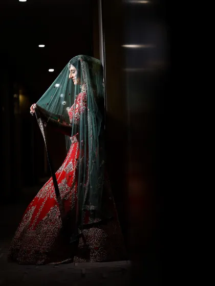 A dramatic and artistic portrait of the bride with her veil. I use shadows and light to create moody and timeless images.