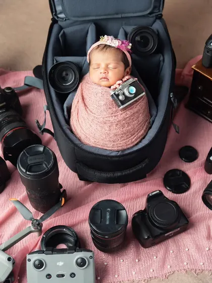 A photographer in the making. This was a special request from a photographer dad, and I loved setting up my camera gear around his precious newborn.