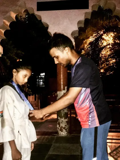 Awarding a medal to a deserving student. This is the moment all the hard work is for.