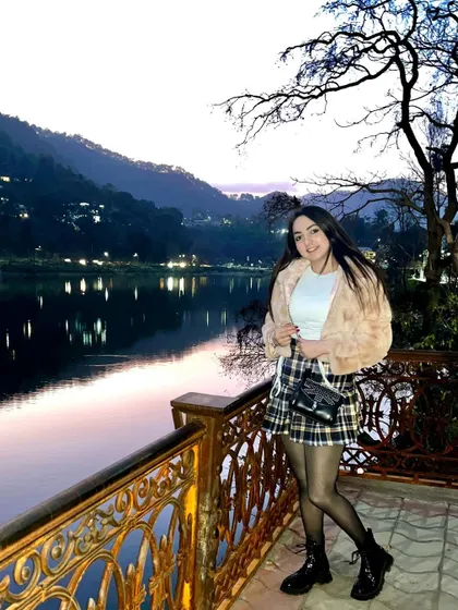 The view in Nainital was just too good not to share. This photo showcases the stunning landscape at sunset, a perfect postcard moment for my travel diary.