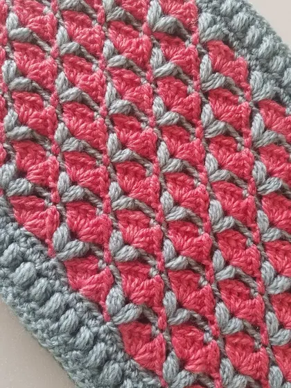 An angled view of the Cardamom Blossoms stitch. The pattern looks intricate but is quite relaxing to work on once you get the hang of it.
