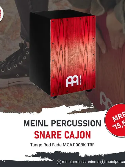 The Meinl Snare Cajon in a Tango Red Fade finish. This cajon features internal snare wires to produce a crisp snare effect, making it a versatile all-in-one percussion instrument.