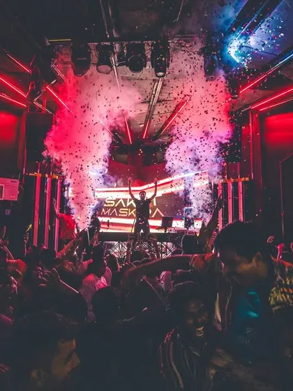 A packed club, hands in the air, and the CO2 cannons firing right at the drop. This shot from a night at Flo in Bangalore perfectly captures the explosive energy of my club sets.