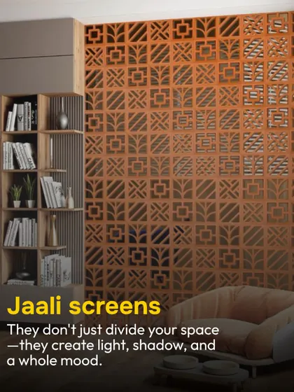 Jaali screens don't just divide a space; they create a whole mood. This terracotta jaali acts as a stunning partition wall, playing with light and shadow to add depth and character to the room.