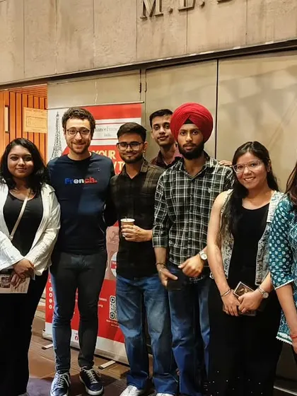 Sebastian Marx poses with a group of students and audience members after his show. Our events provide opportunities for the community to connect directly with international artists.