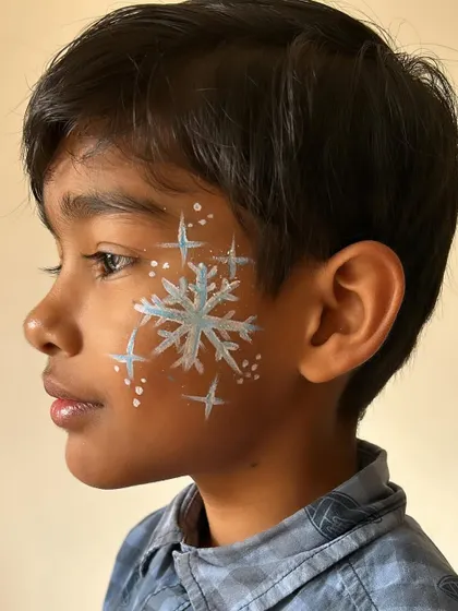 A classic snowflake design, perfect for bringing a touch of winter wonder to any child's cheek.