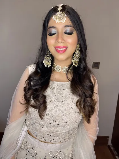 Another look at the stunning silver eye makeup, which catches the light beautifully.